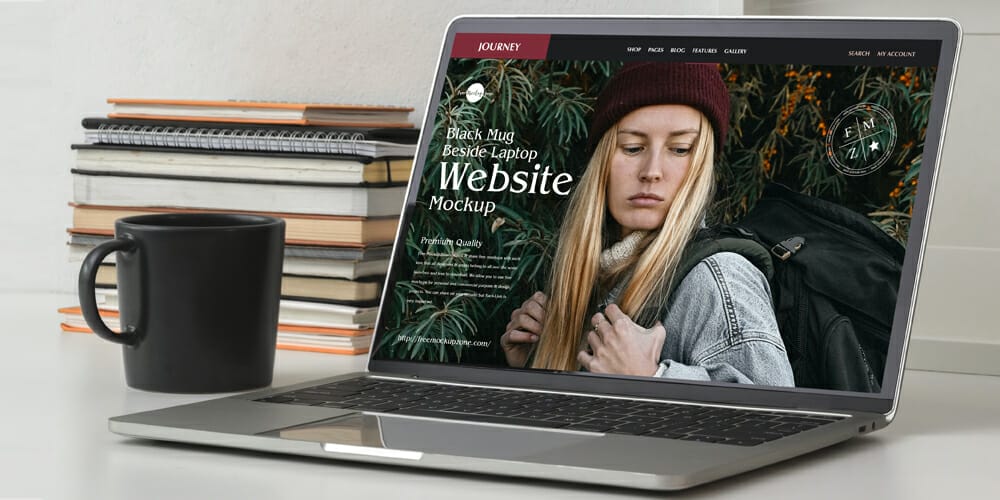 Black Mug Beside Laptop Website Mockup