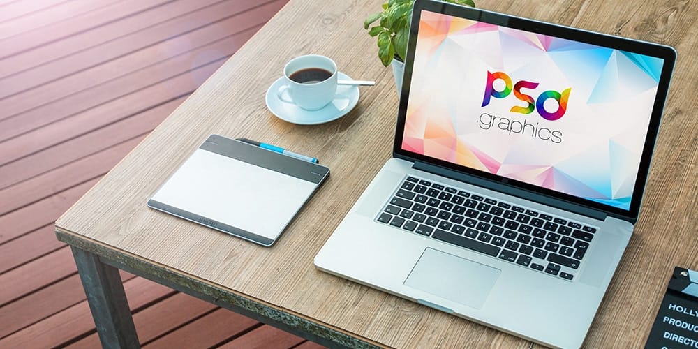 Macbook Pro on Table Mockup PSD