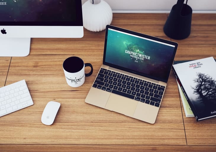 Top View of MacBook Workspace Mockup PSD