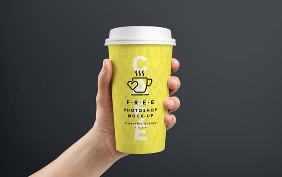 Coffee Cup In Hand MockUp