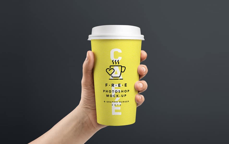 Coffee Cup In Hand MockUp