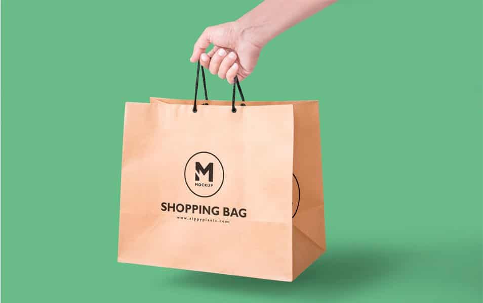 Free Paper Bag Mockup In Handheld View