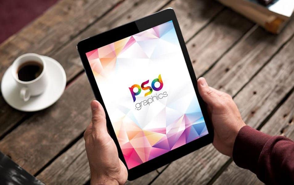 iPad in Hand Mockup Free PSD