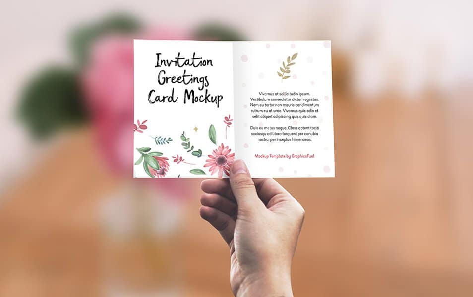 Invitation Greeting Card in Hand Mockup PSD