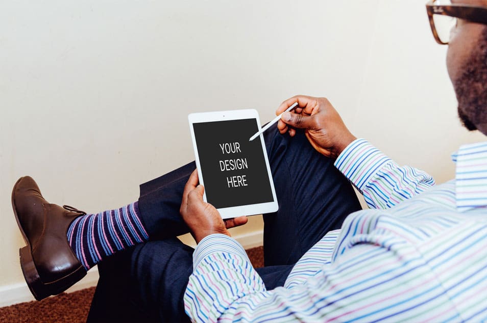 Man Using iPad Air Mockup 2 Man Using iPad Air Mockup