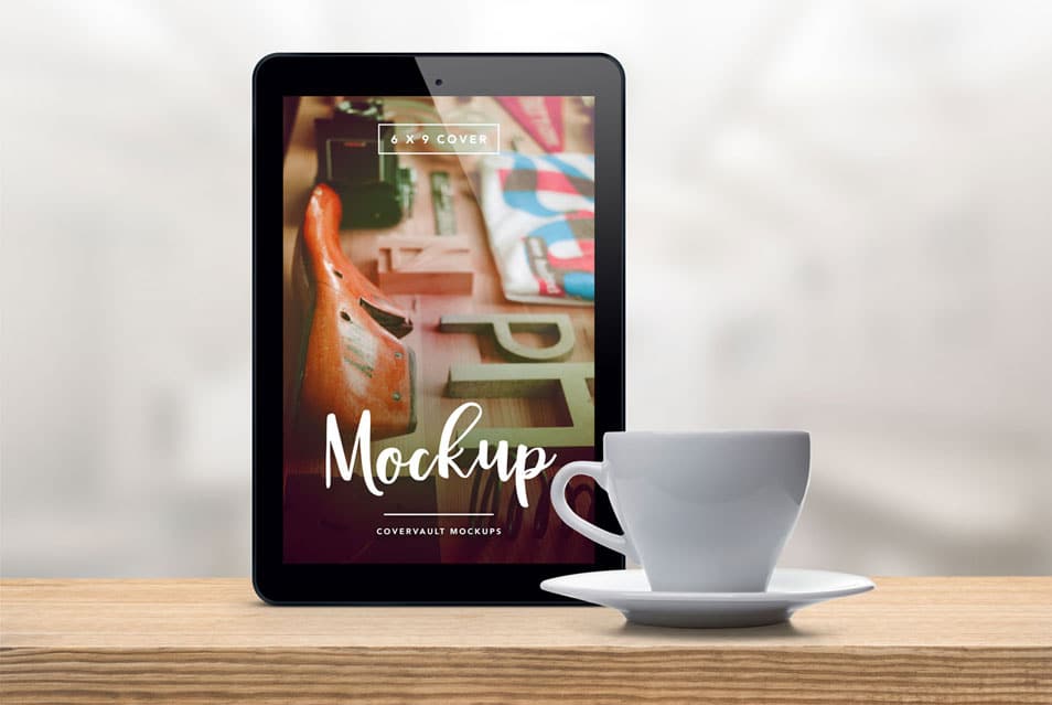 Upright Tablet with Coffee Cup PSD Mockup 2 Upright Tablet with Coffee Cup PSD Mockup