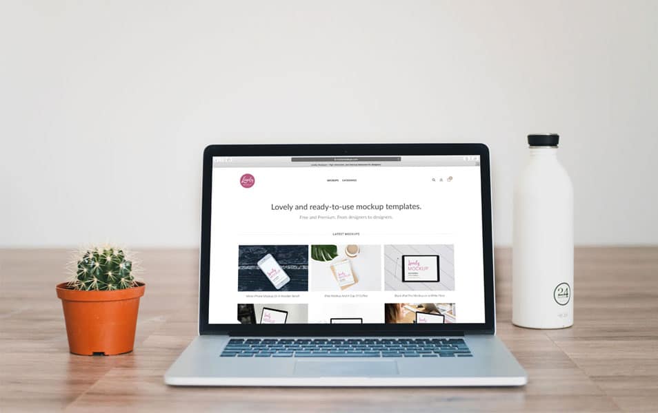 Macbook Mockup With Cactus on Wooden floor 2 Macbook Mockup With Cactus on Wooden floor