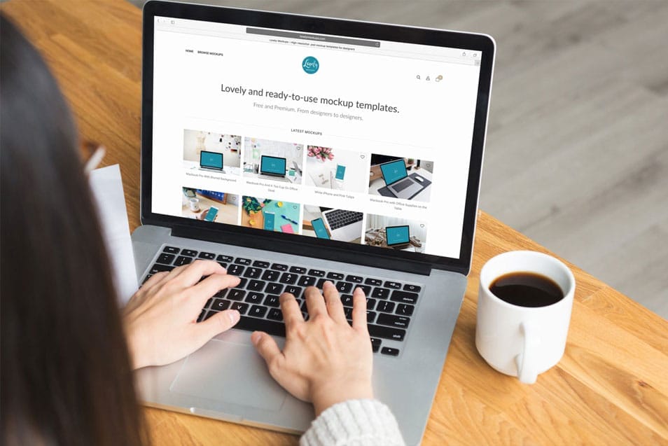 Woman Working on a Macbook Pro Mockup 2 Woman Working on a Macbook Pro MockupWoman Working on a Macbook Pro Mockup