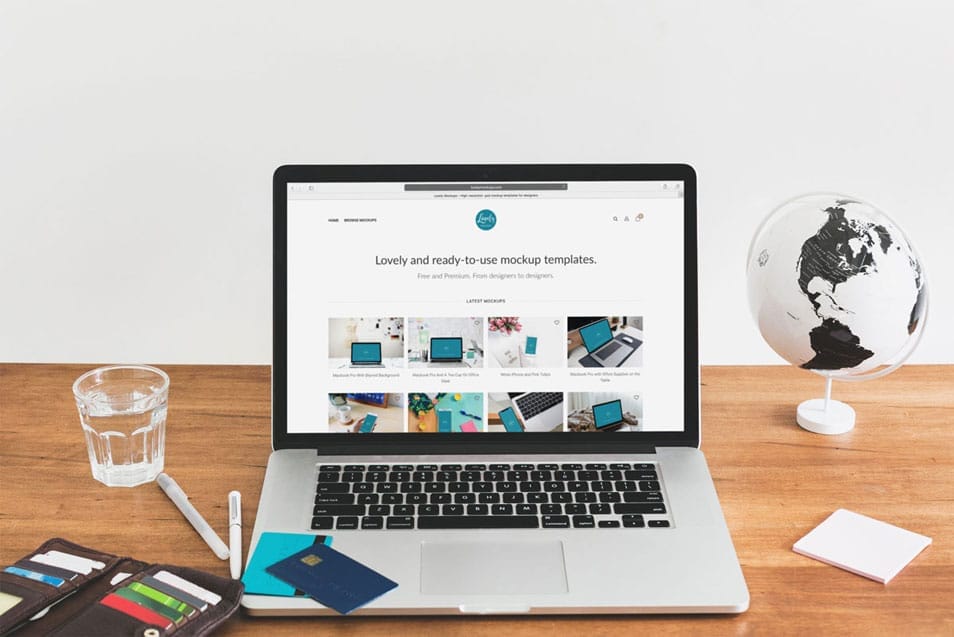 Macbook Mockup With Credit Cards on Table 2 Macbook Mockup With Credit Cards on Table