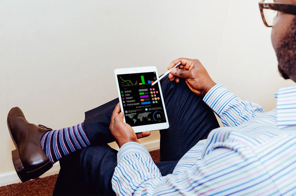 Man holding iPad Mockup 2 Man holding iPad Mockup