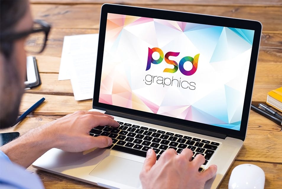 Man Working on Macbook Mockup 2 Man Working on Macbook Mockup