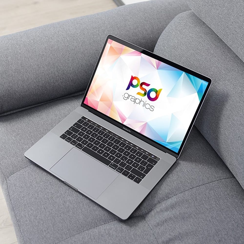 Macbook Pro on Sofa Mockup 1 Macbook Pro on Sofa Mockup