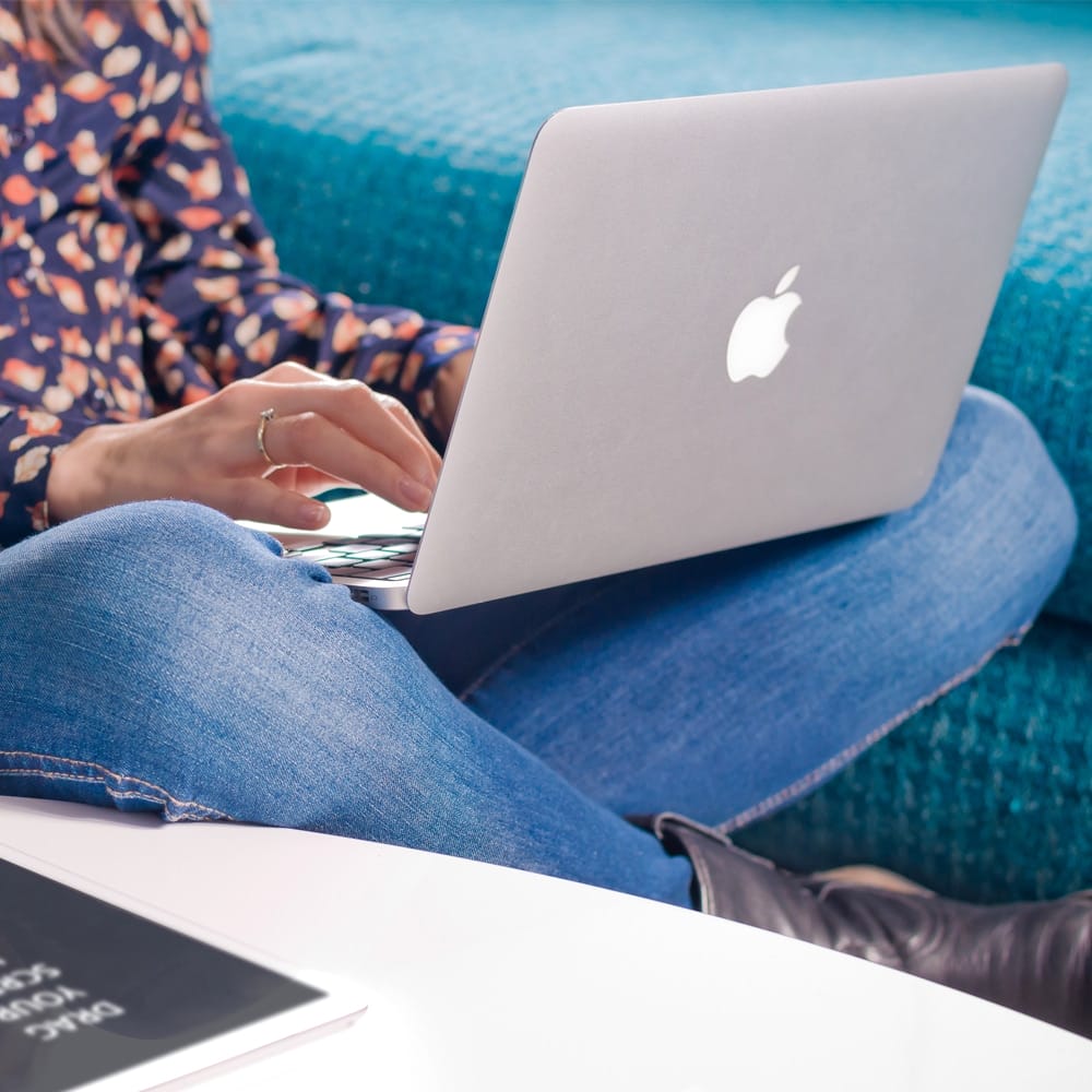 Woman Writes on Macbook Air Free Mockup PSD 1 Woman Writes on Macbook Air Free Mockup PSD
