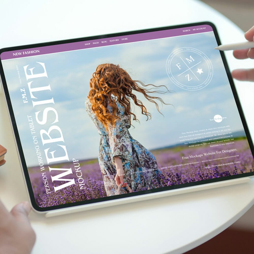 Free Person Working On Tablet Website Mockup 1 Free Person Working On Tablet Website Mockup