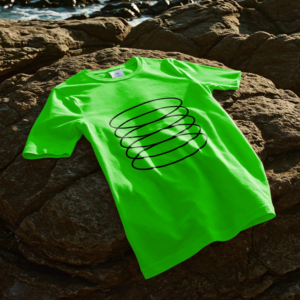 Free T-shirt Mockup on a Seaside Rock PSD 1 Free T-shirt Mockup on a Seaside Rock PSD