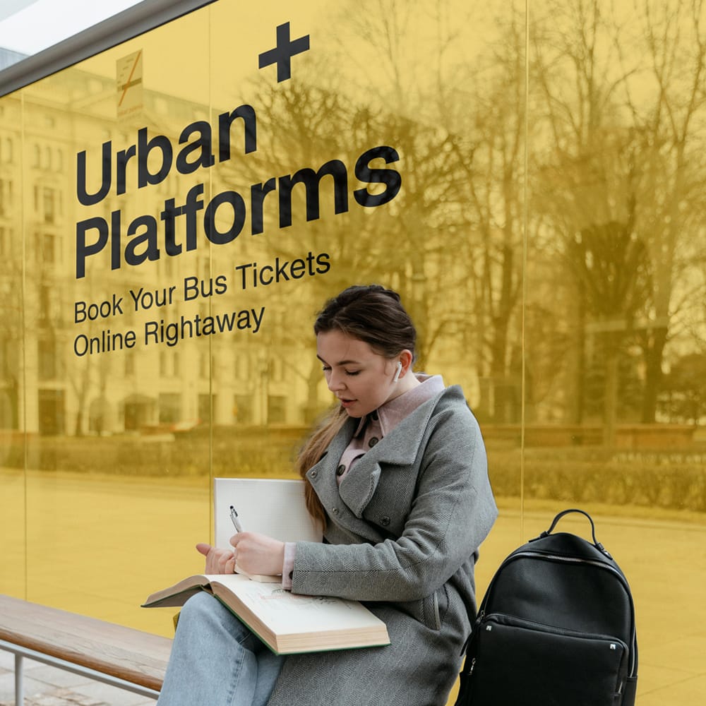 Free Woman Waiting in a Bus Stop Mockup PSD 1 Free Woman Waiting in a Bus Stop Mockup PSD