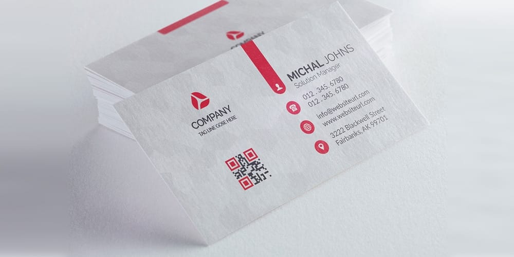 White business card with red details