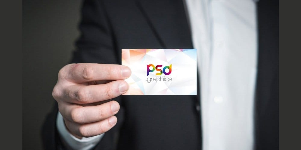 Business Card Holding in Hand Mockup PSD