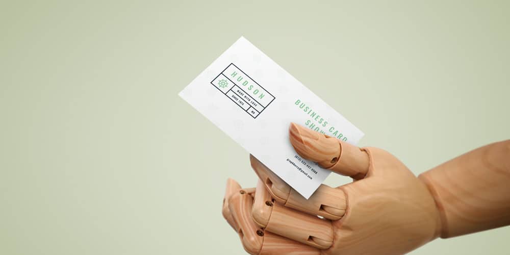 Business Card In Wooden Hand Mockup