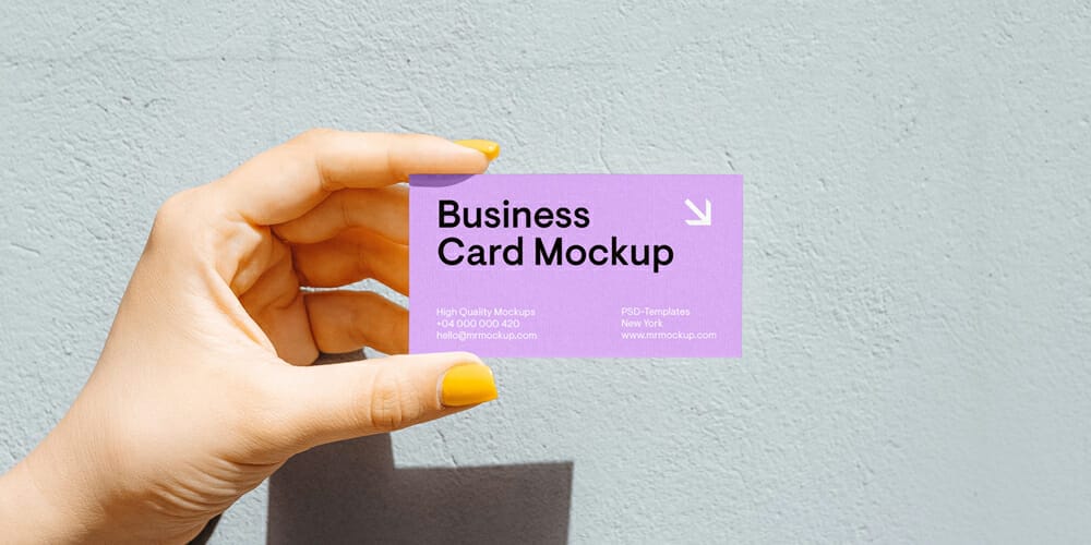 Business Card in Women Hand Mockup
