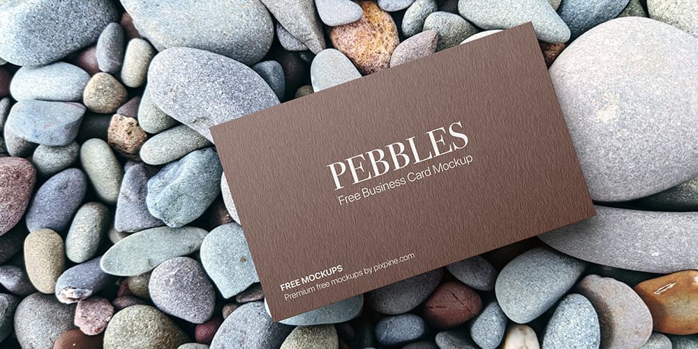 Business Card on Pebbles Mockup PSD