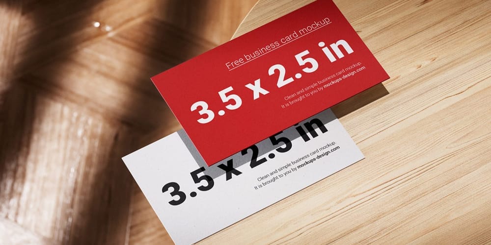 Business Cards Lying on a Wooden Table Mockup