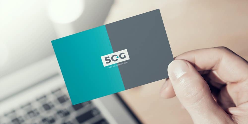 Free Man Showing Business Card in Hand Mockup