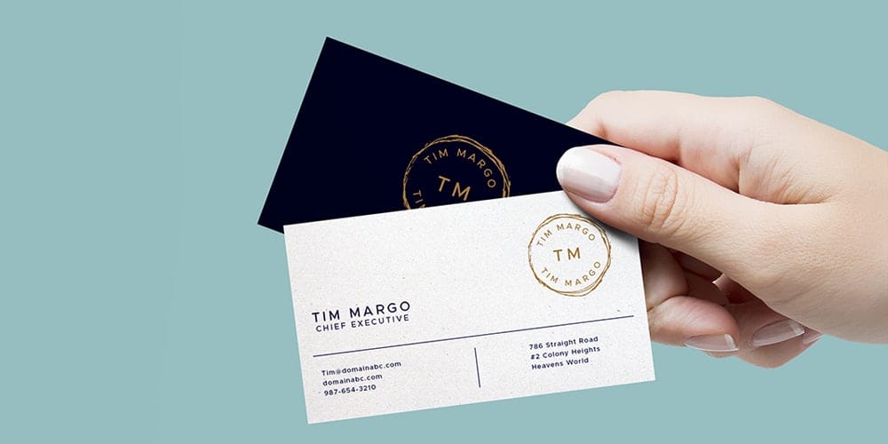 Hand Holding Business Cards Mockup PSD