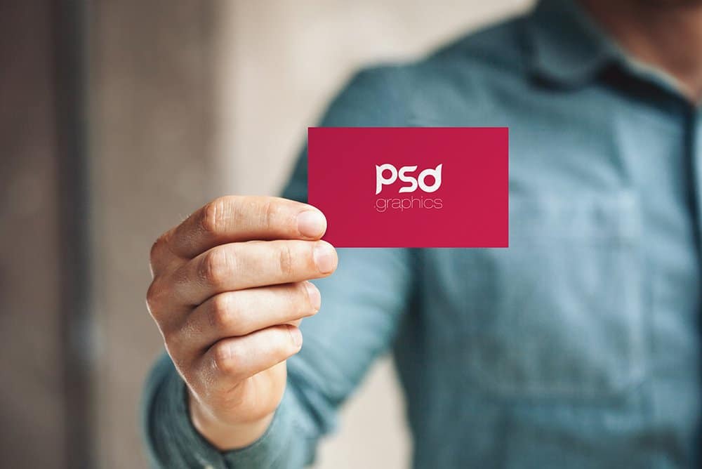 Man Holding Business Card