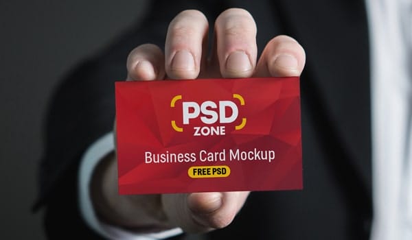 Business Card in Hand Mockup PSD