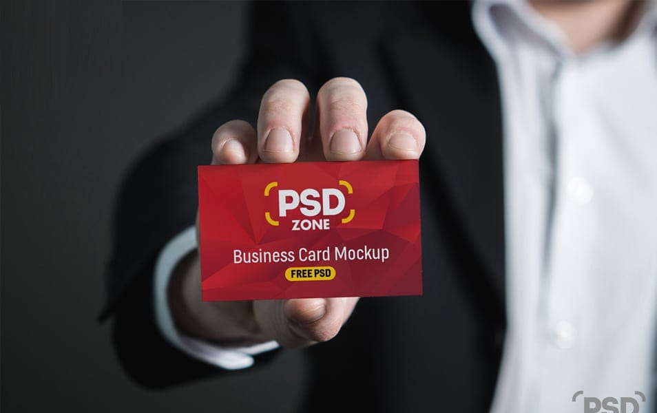 Business Card in Hand Mockup PSD