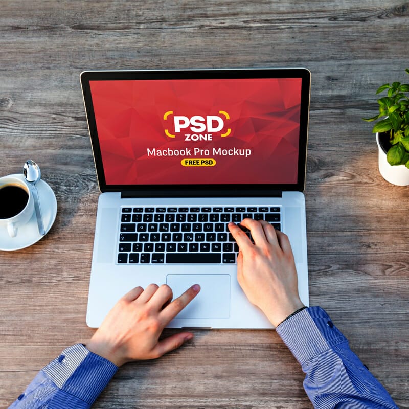 Man Working on Macbook Mockup Free PSD