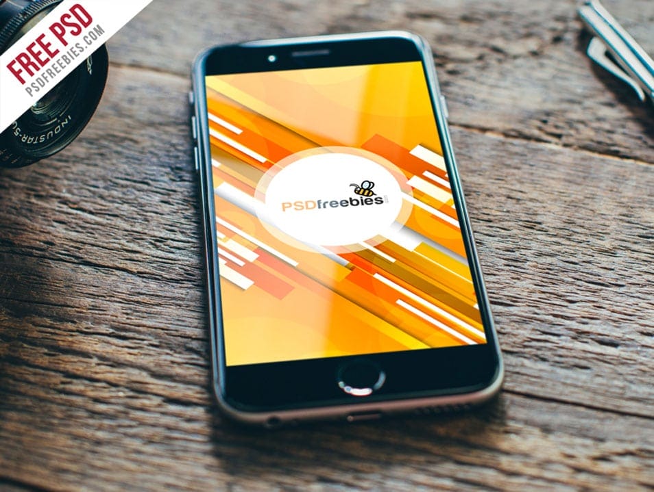 Apple iPhone on Wooden Table Mockup PSD