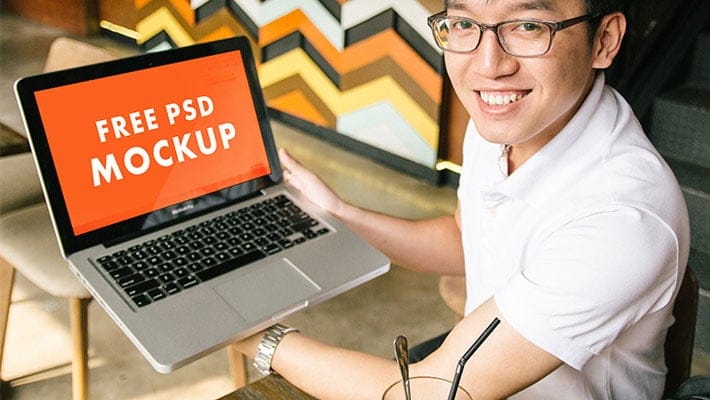 Hands on Laptop Macbook Pro PSD Mockups