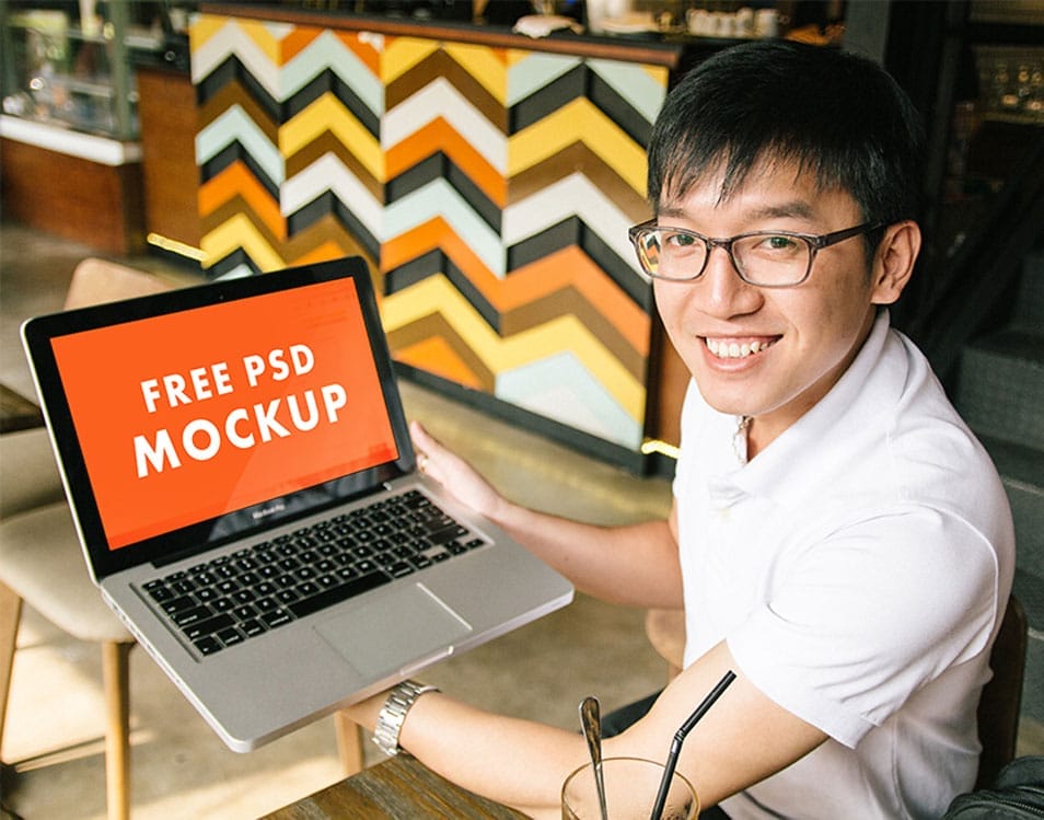 Hands on Laptop Macbook Pro PSD Mockups