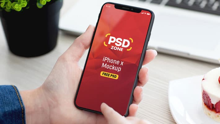 Male Hand Holding iPhone X Mockup PSD
