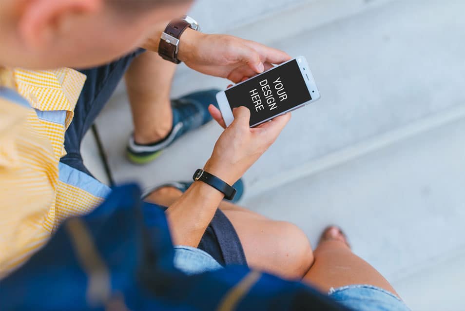 Man Holding iPhone Mockup