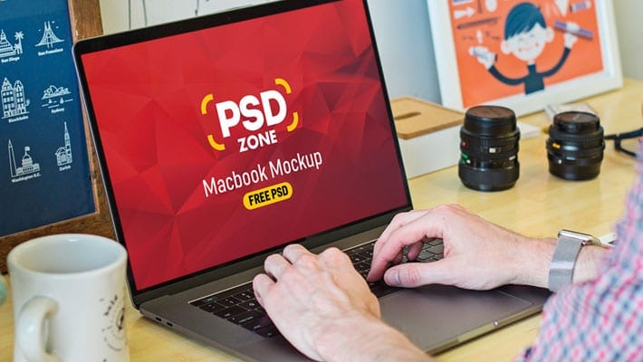 Man Working on Macbook Mockup PSD