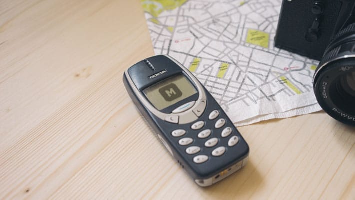 Nokia 3310 on a Wooden Desk