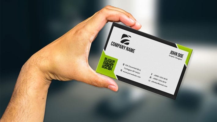 Free Hand Holding Business Card Mockup PSD