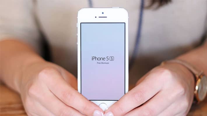 Free iPhone 5S In Hand Mockups