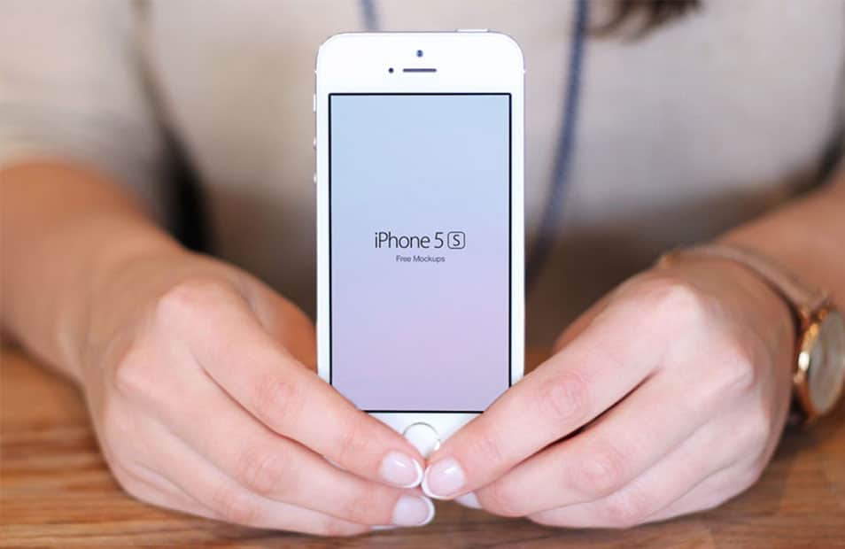 Free iPhone 5S In Hand Mockups