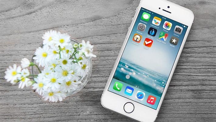 Free iPhone Mockup with Wooden Background