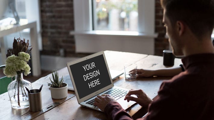 Man Using Macbook Mockup