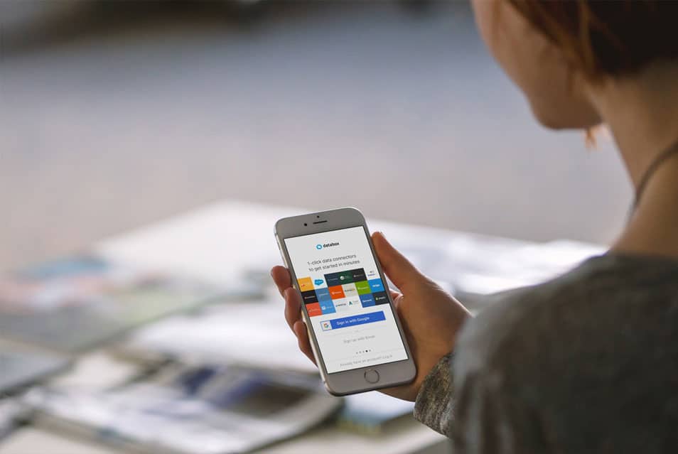 Young Woman with White iPhone Mockup