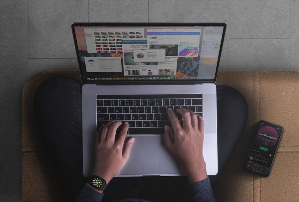 Apple Devices in Sofa Mockup PSD