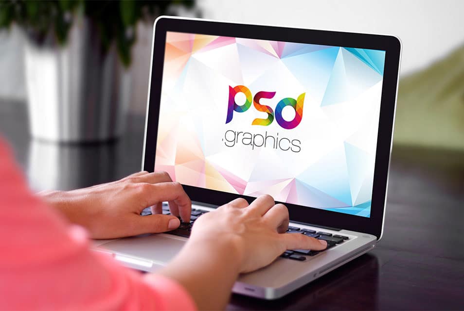 Woman Working on MacBook Pro Mockup Free PSD