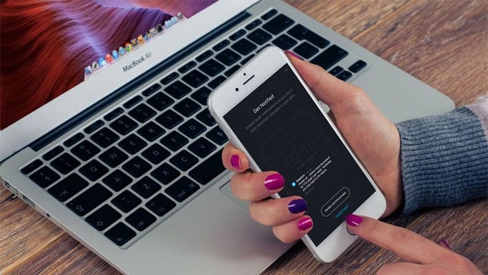 Woman with iPhone in her hand