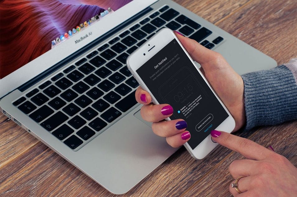 Woman with iPhone in her hand