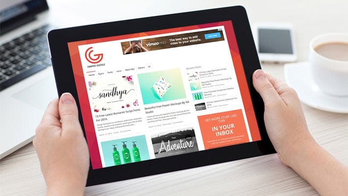 iPad in Hand Mockup Free PSD